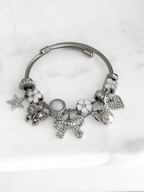 Pulsera Flores Blancas & Lazo Elegante